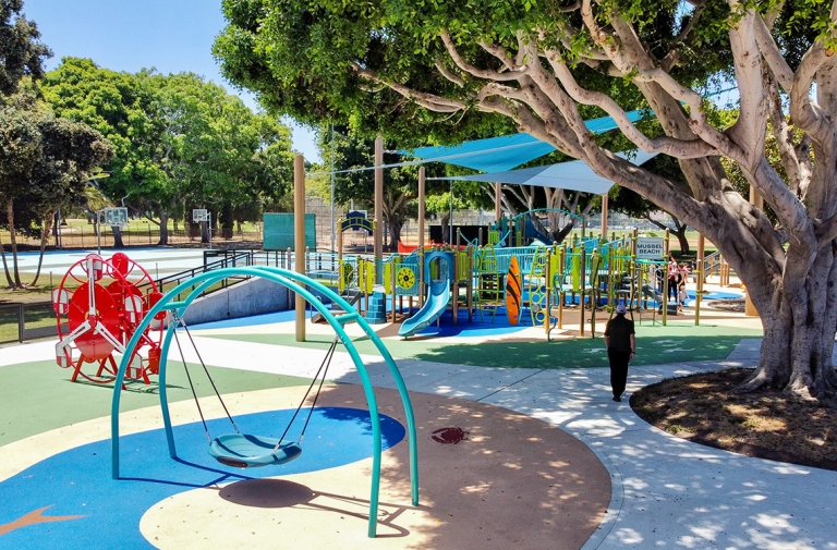 blue playground safety surface at marine park, santa monica