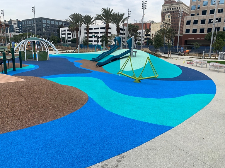 blue and teal playground surface lincoln park, long beach