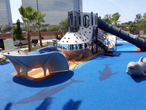 playground equipment on new rubber playground safety surfacing