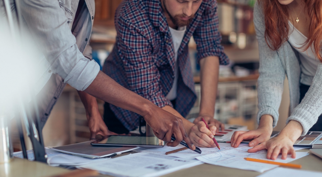 Close up of a coworkers working on a project