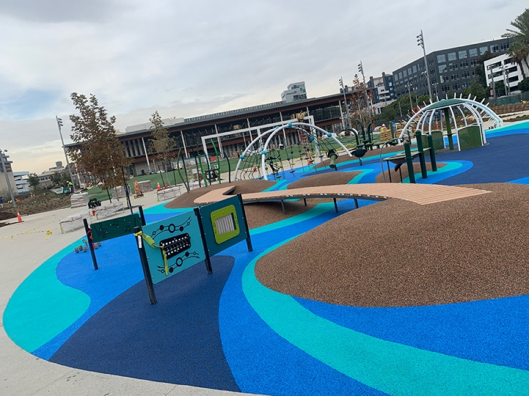 blue and teal rubber playground surface lincoln park, long beach