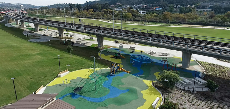 playground under train tracks
