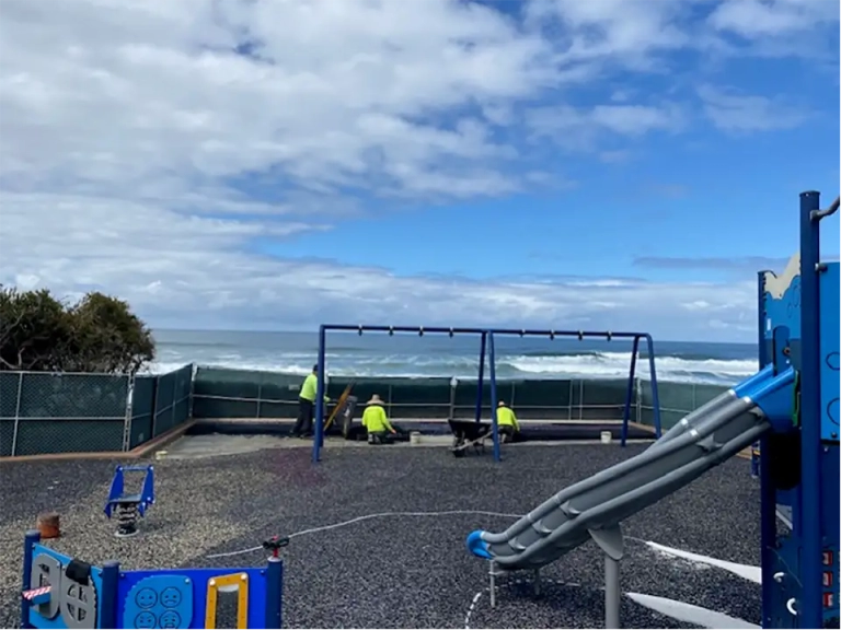 installers begin work on removing old playground surface