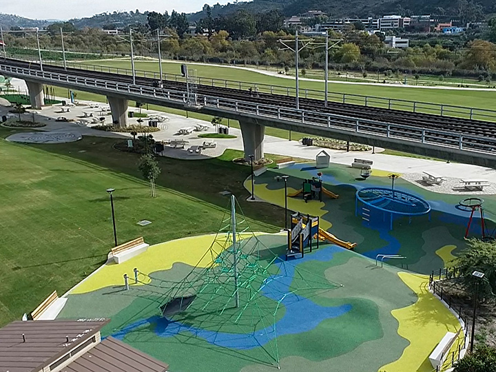 playground under train tracks