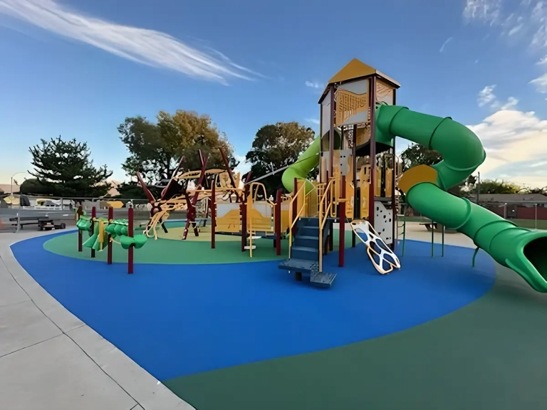 playground with multiple slides and play equipment